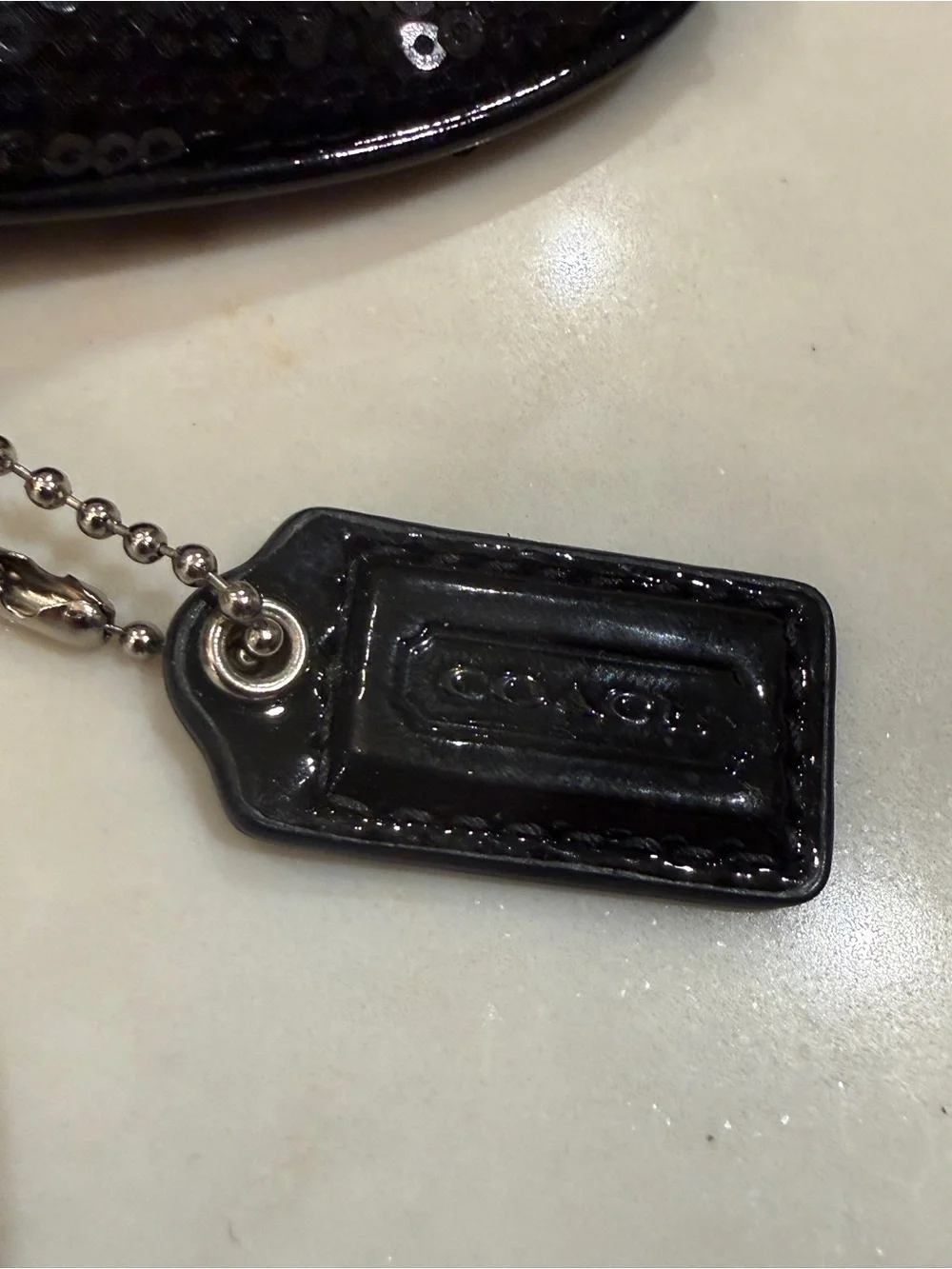 Coach Black Sequin Wristlet with Silver Hardware